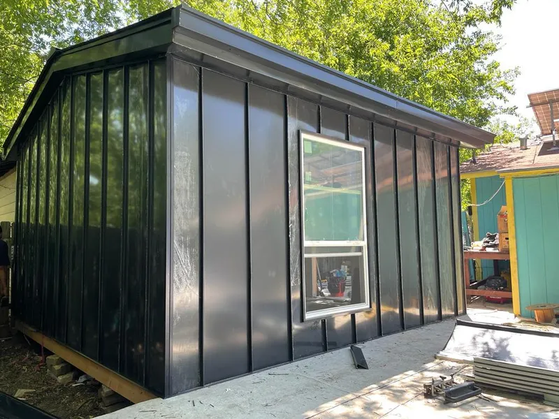 Black standing seam metal wall panels for Metal Roof Installation in Jesup